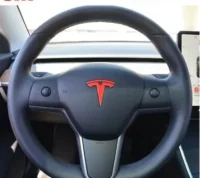 Tesla emblem ratt